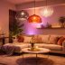 apportez une touche moderne et chaleureuse à votre salon grâce aux luminaires design kartell associés aux éclairages connectés philips hue pour une ambiance cosy et personnalisée.